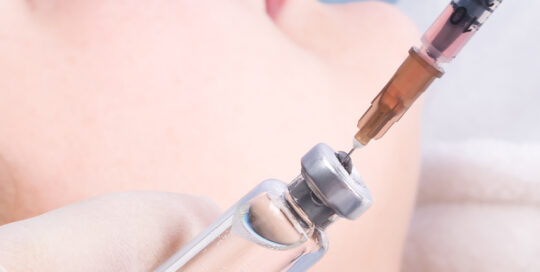 peptide therapy with injection and woman laying in the background